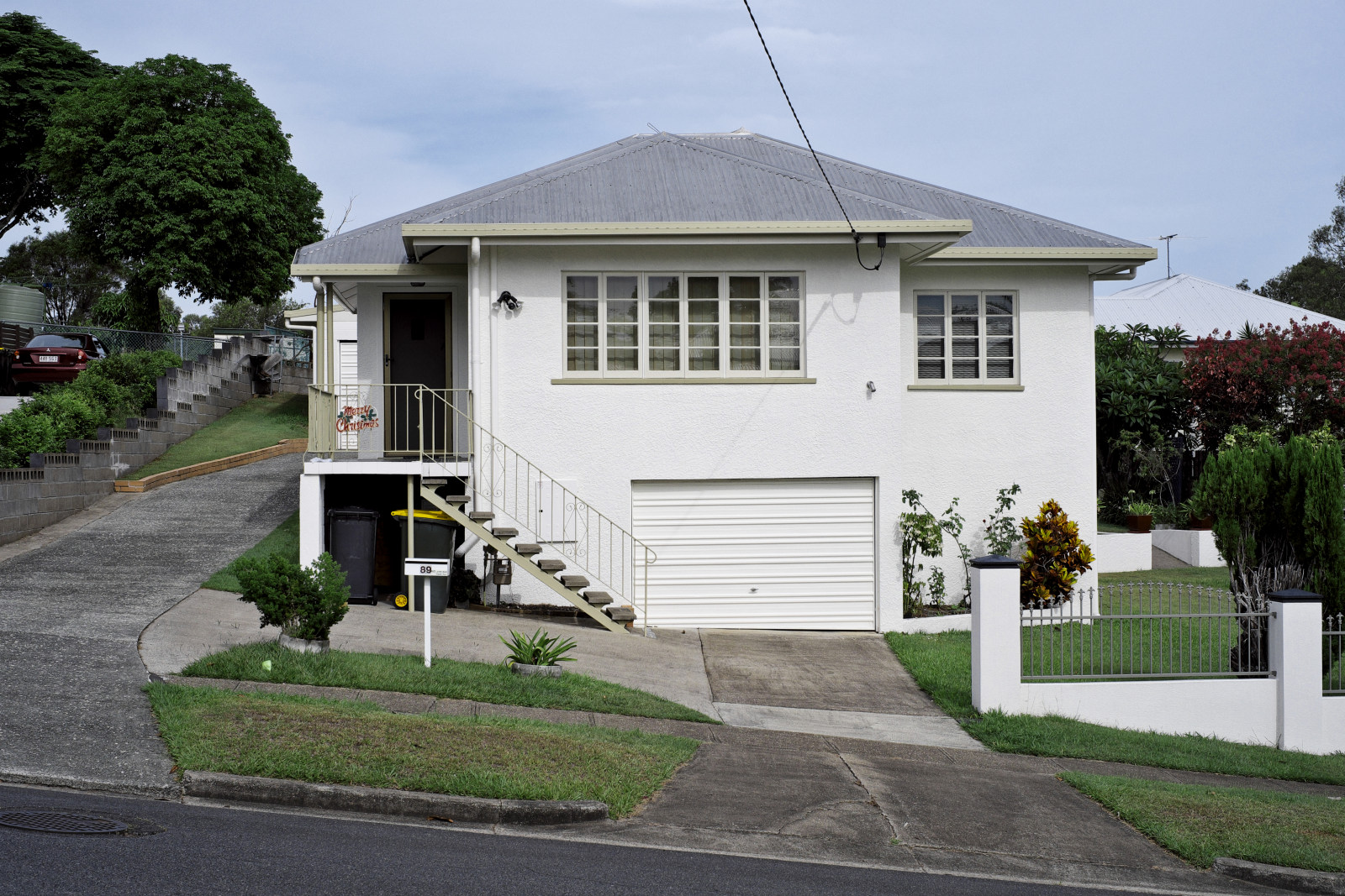 Rendered brick 40's 50's home, in Carina Brisbane. Architectural photography by Kent Johnson.