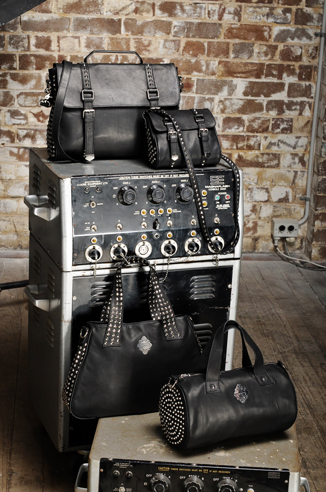 Studio product marketing shot, handbags - on theme for the biker fashion inspired fashion handbag campaign. Photography by Kent Johnson.