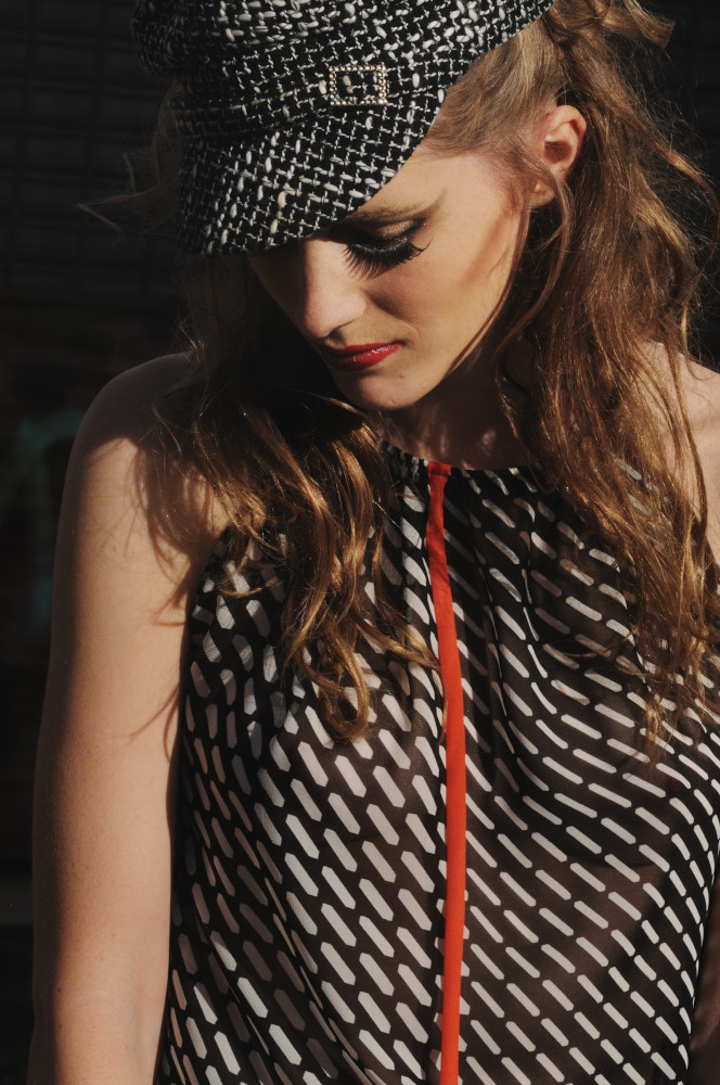 Fashion Portrait; Rapture in Sydenham - Alicia Hollen Adeola (Rung) Top & Black Bella Skirt, Thrift Shop ‘New’ Engineers Cap - Editorial Fashion Photography by Kent Johnson.