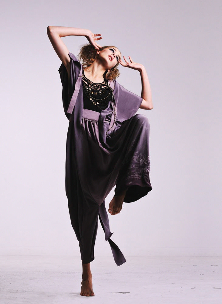 Studio fashion shot, model with dramatic movement