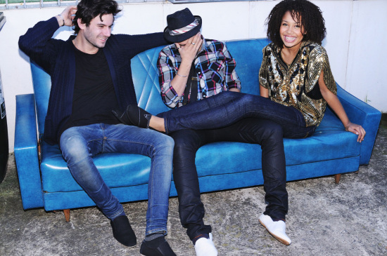 Shoe campaign, two guys and a girl laughing, party on a couch, photoshoot on location, Sydney, Australia.