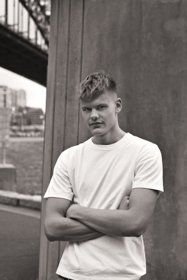 Linus, modelling portfolio shot under the Sydney Harbour Bridge.