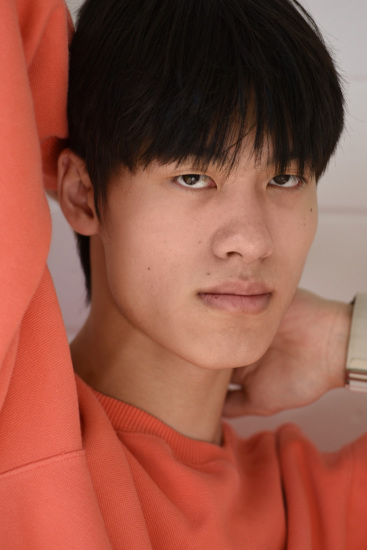 Tight headshot, male modelling portfolio on location.