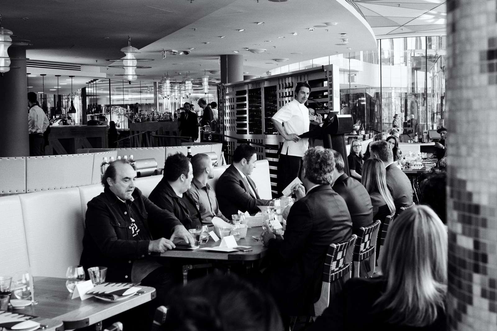 Viwing a video on Italian produce before the Oro Rosso Luncheon, 5 Course Degustation at Osteria Balla. Photographed by Kent Johnson.