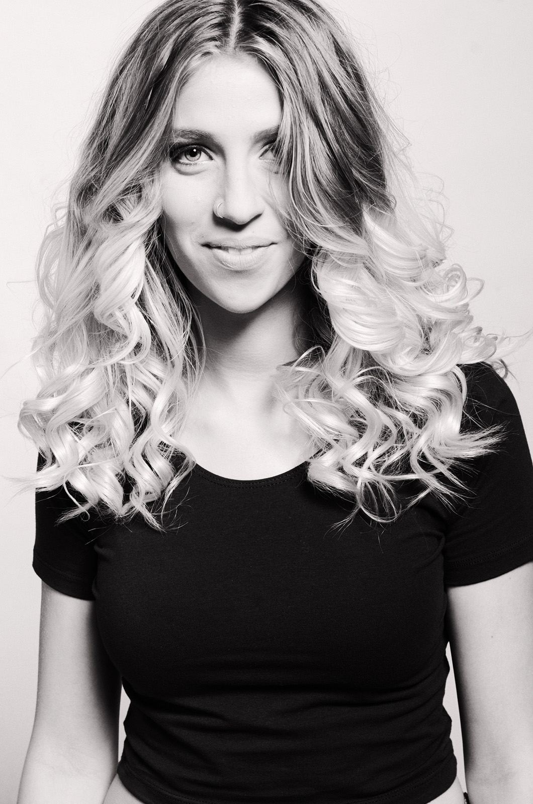 Black and white, studio mid shot fashion portrait of a teenage girl by Kent Johnson Photography, Sydney, Australia.