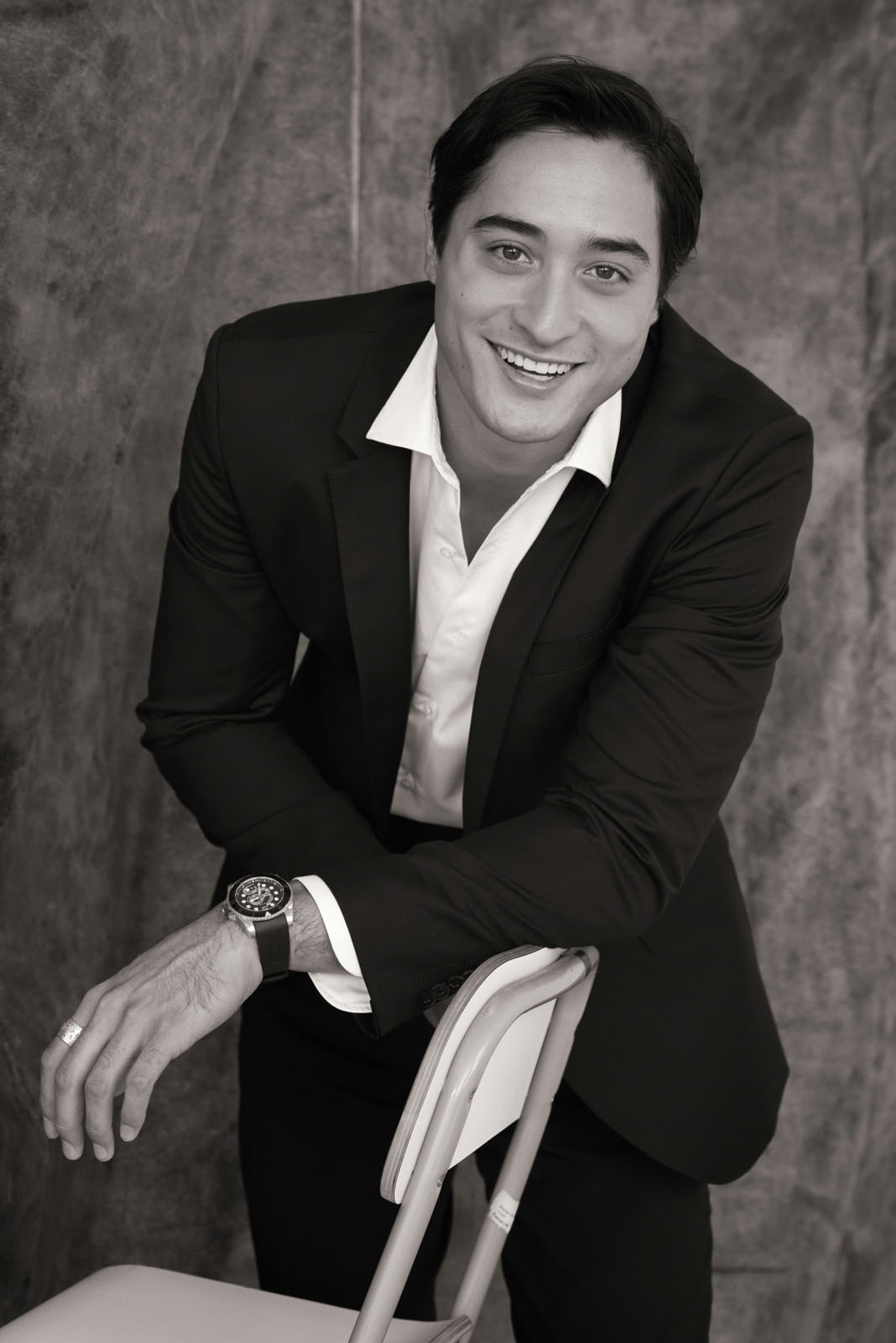 Casual black and white business portrait in the studio. Photographed by Kent Johnson.