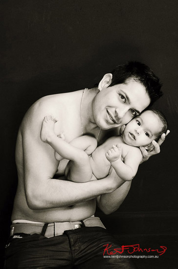 Father and newborn baby portrait. Photographed by Kent Johnson.