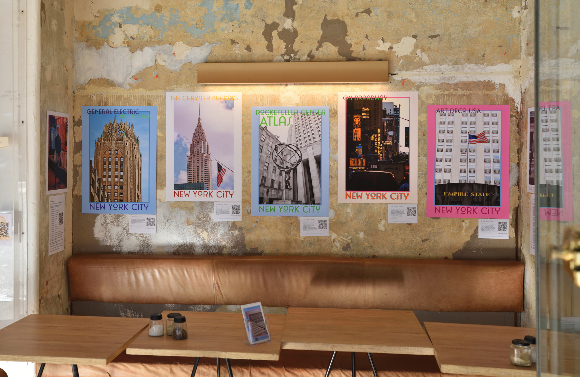 Exhibition Installation, wall 2 at Coral Coffee, Darlinghurst, Sydney. The Poster Show, New York City, Art Deco skyscrapers