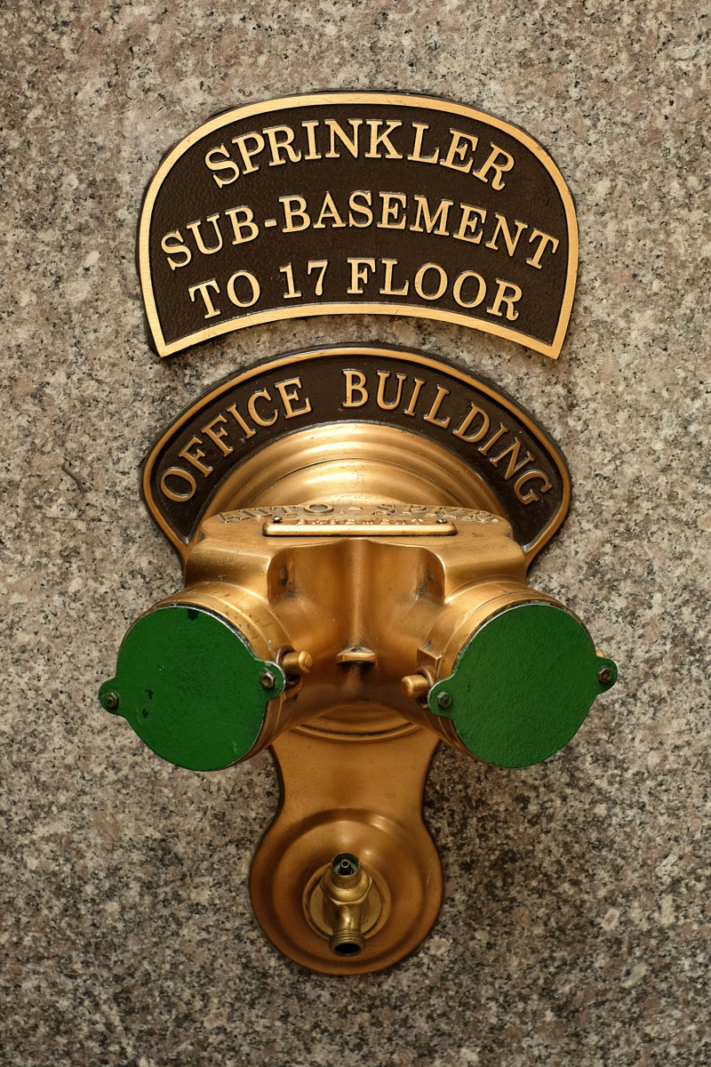 Standpipe system in New York City; on the wall of a Rockefeller Center  office building