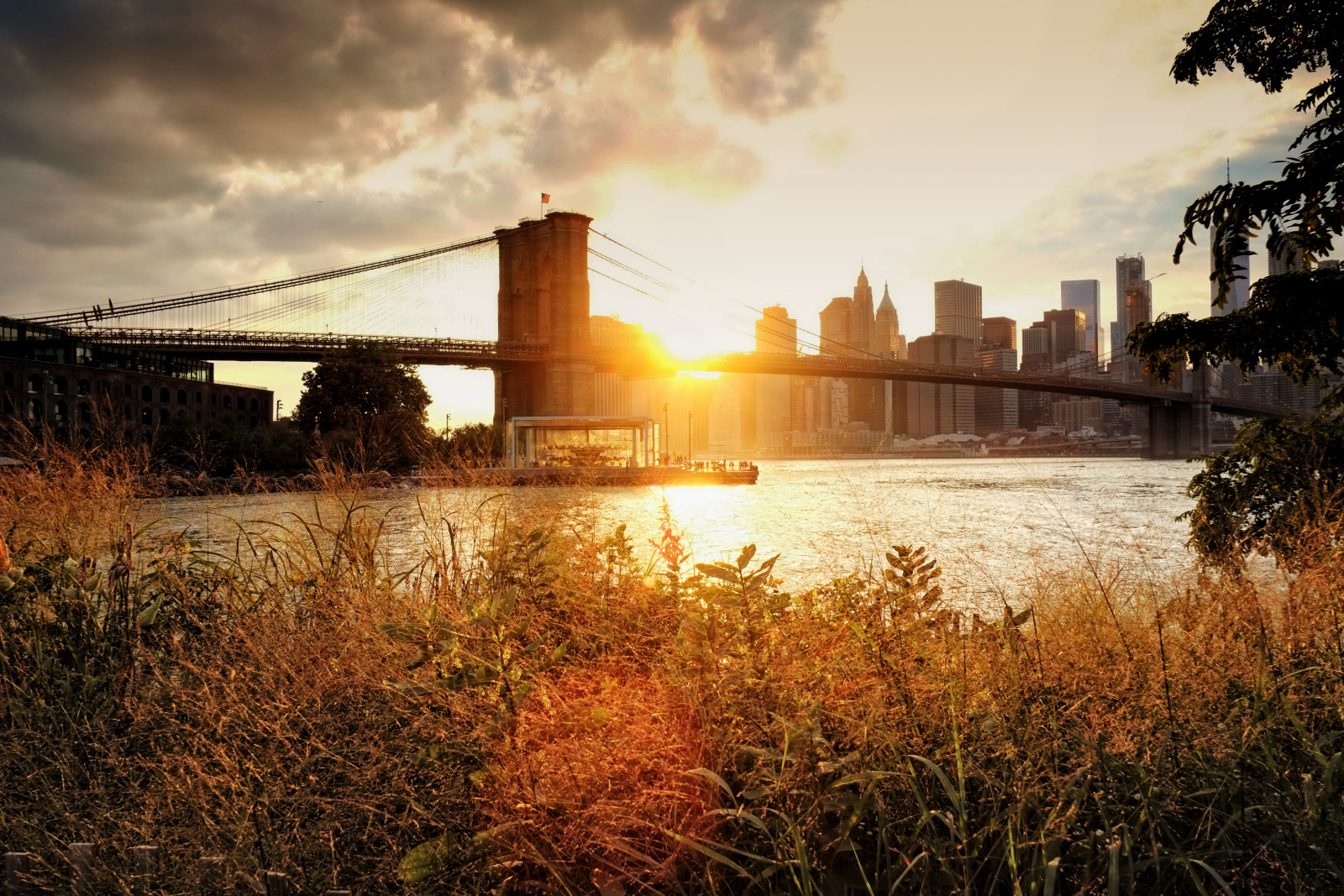 Sunset Brooklyn Bridge and carousel, NYC