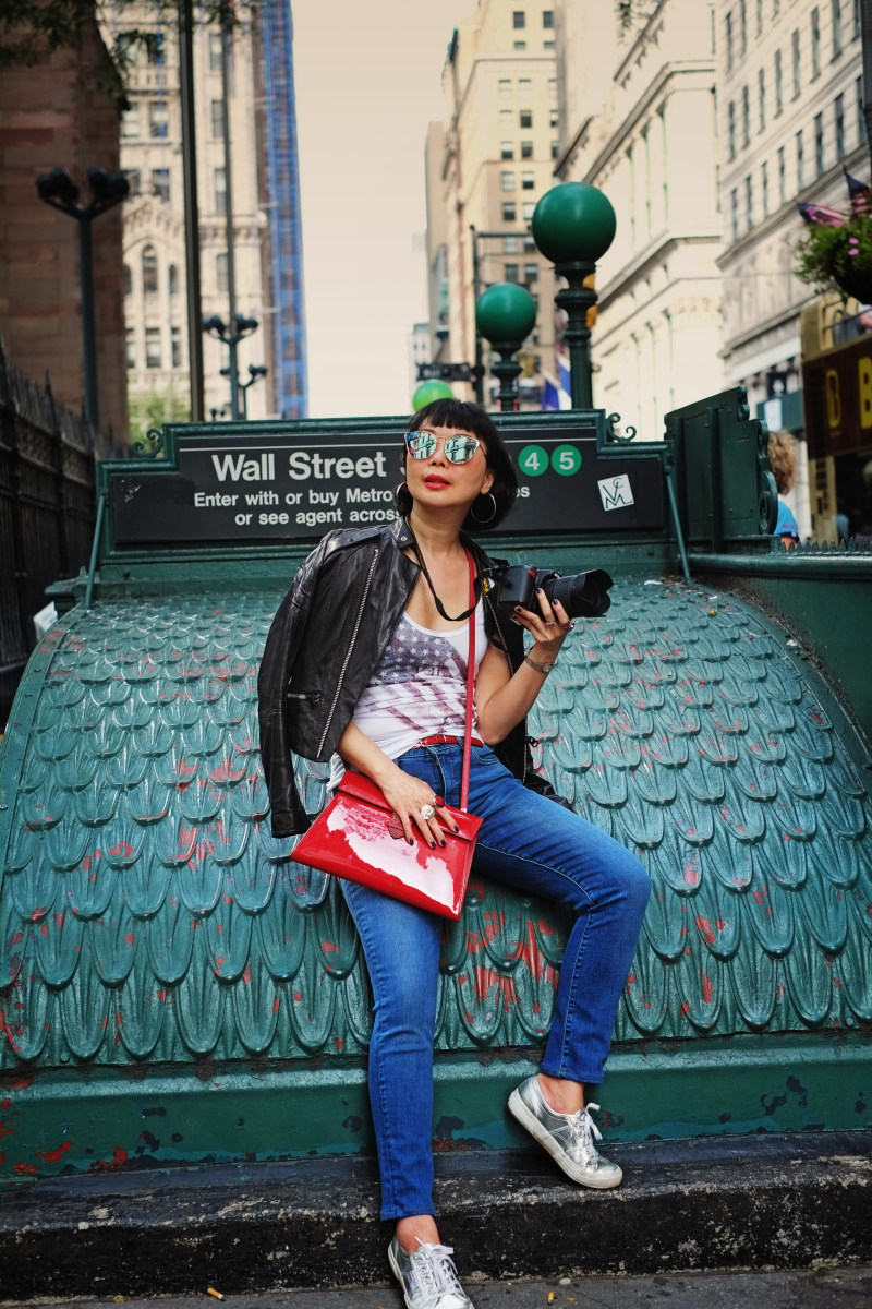 Vivienne at Wall street subway entrance near Trinity Church lower Manhattan