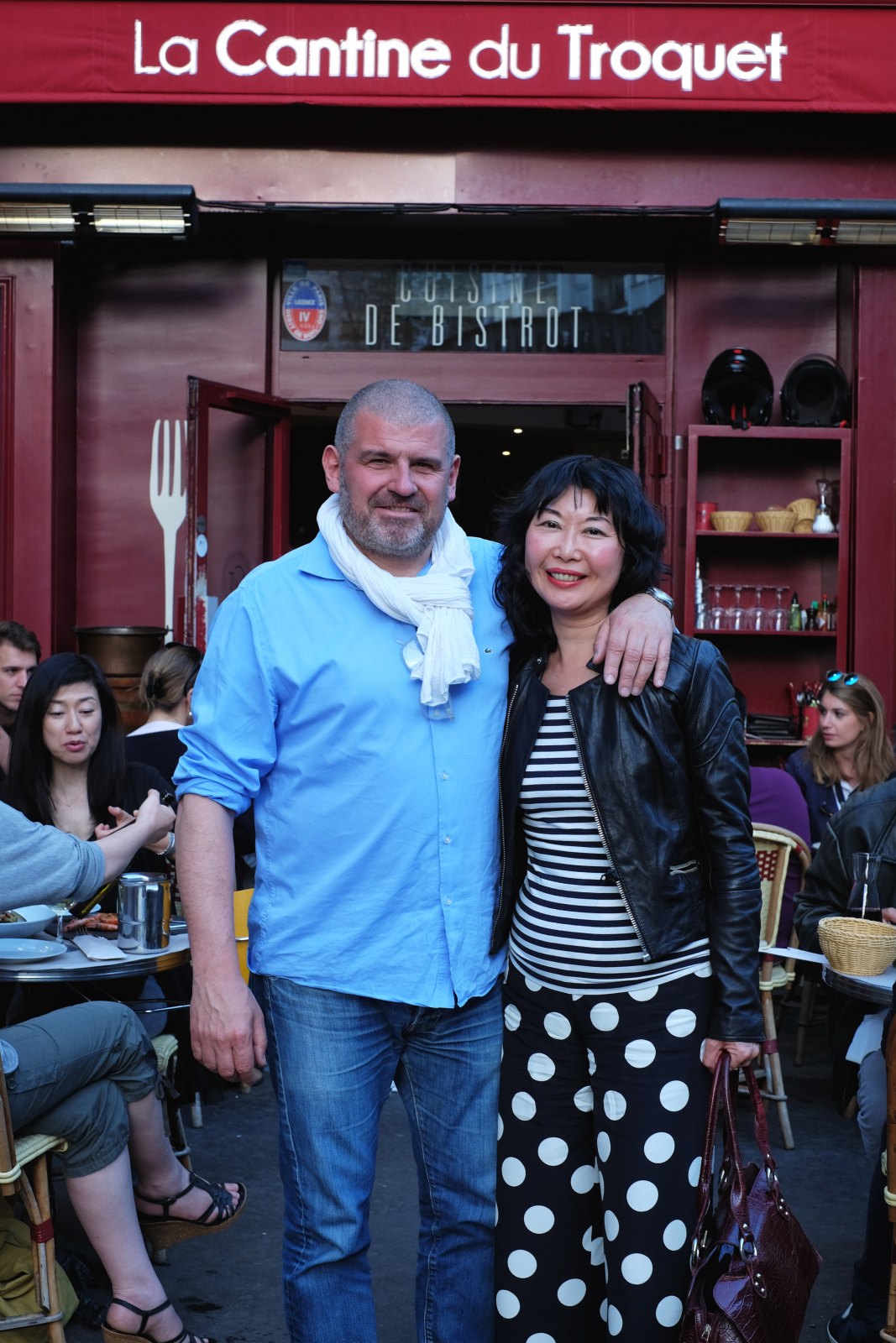 Restaurateur Christian Etchebest with Vivienne at La Cantine du Troquet Dupleix in Paris, France. Food travel and lifestyle photography by Kent Johnson.