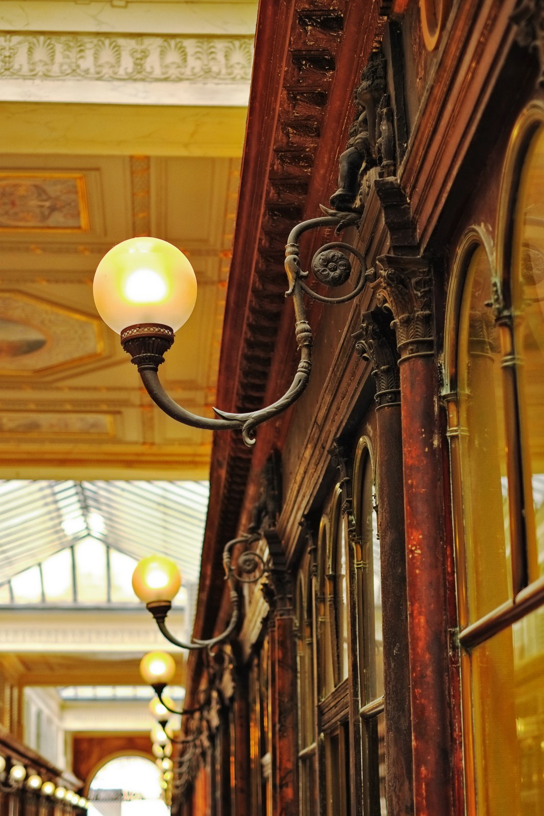 Light fixture detail, Galerie Véro-Dodat, Paris, France. Travel and architecture photography by Kent Johnson.