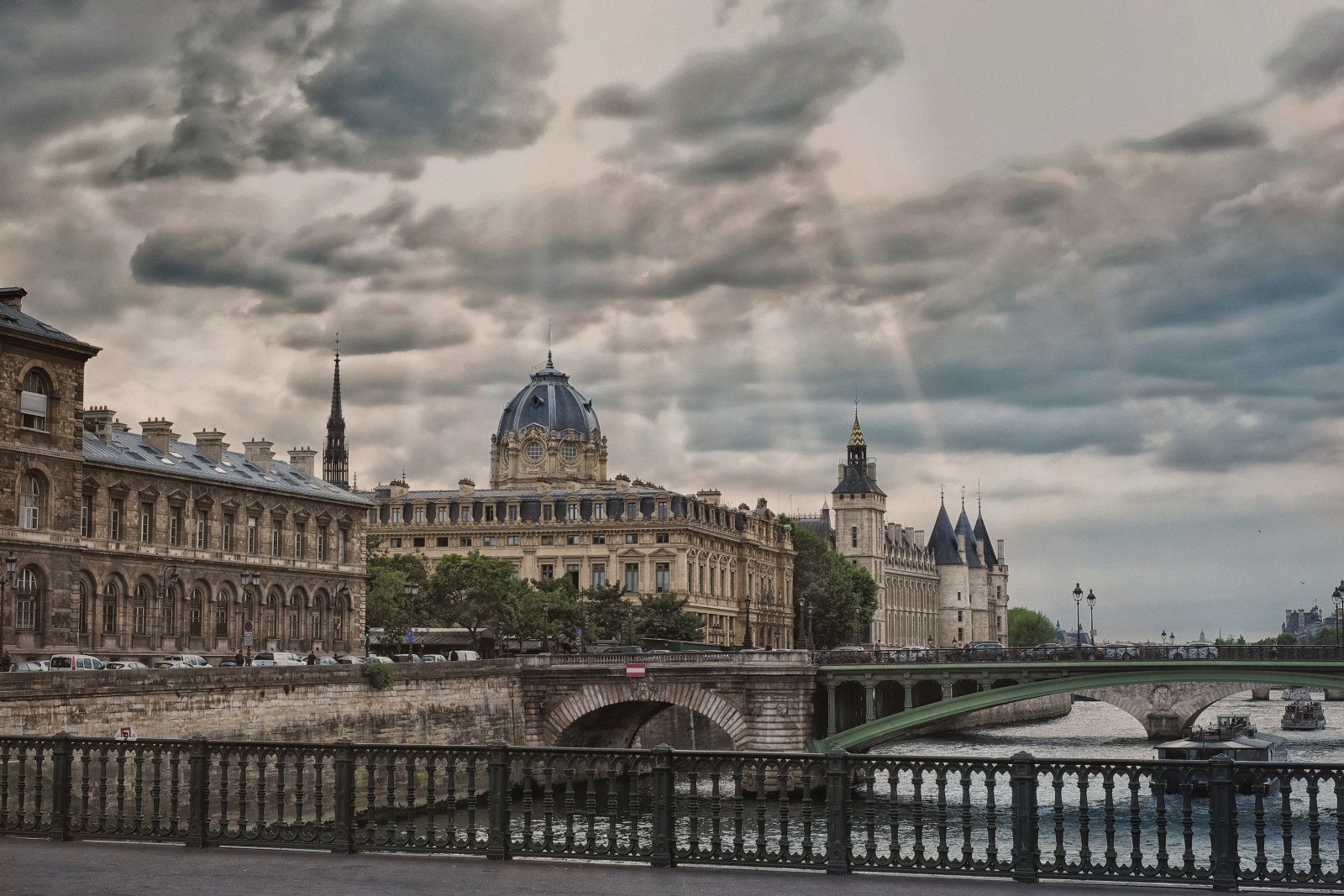 Palais de la Cité from Pont d'Arcole, paris, France. . Travel fashion and lifestyle photography by Kent Johnson.