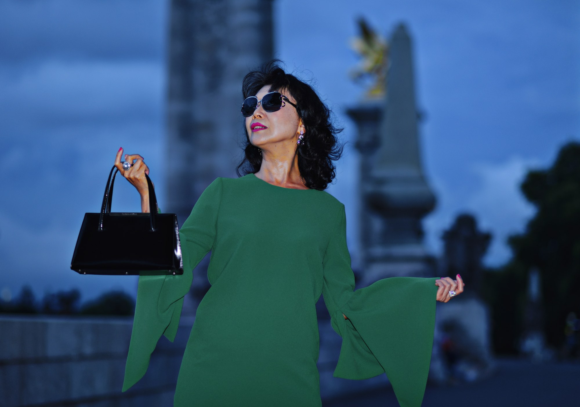 A fashion night shoot on Pont Alexandre III in Paris. Travel fashion and lifestyle photography by Kent Johnson.