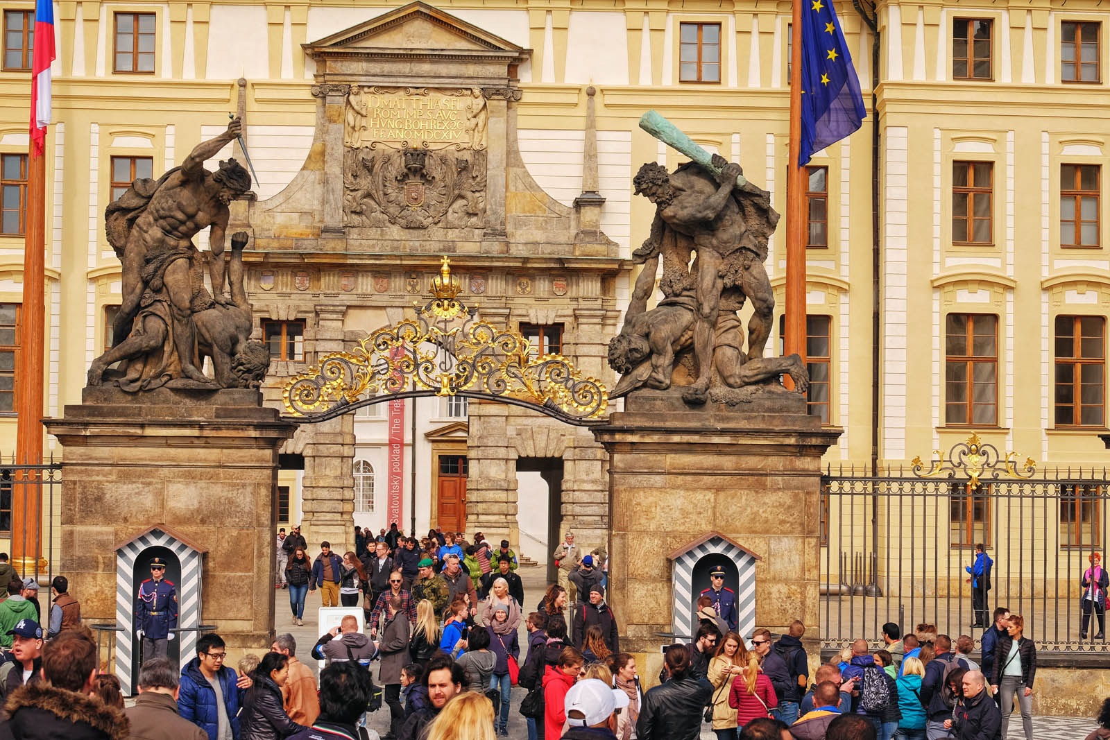 Palace gards in boxes and the Prague castle Fighting Giants Gate