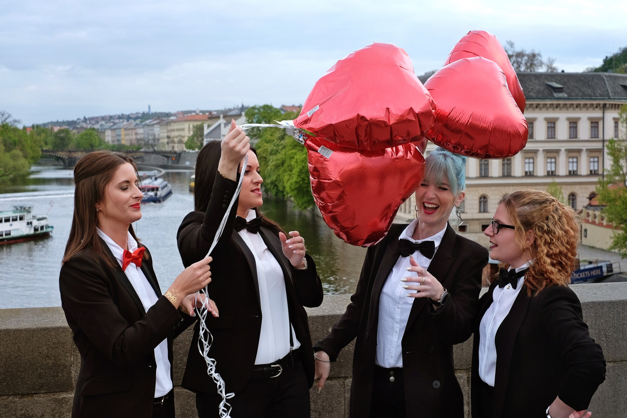 Special Police, Friends of the Groom; bucks party in dinner suits on the Charles Bridge in Prague. Travel photography by Kent Johnson.